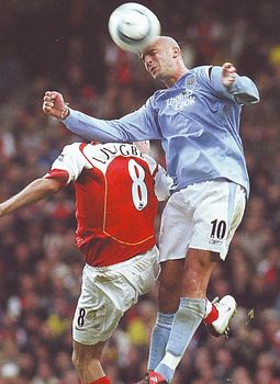 arsenal home 2004 to 05 action1