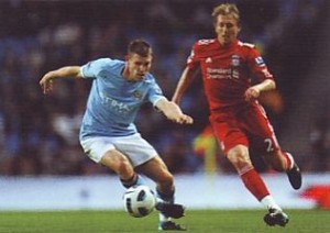 liverpool home 2010 to 11 action